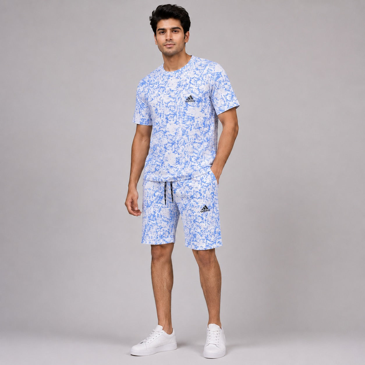Premium men's blue abstract print t-shirt and shorts co-ord set designed for summer. Soft, breathable fabric with a relaxed fit, matching drawstring shorts, and modern casual streetwear style perfect for daily wear, travel, gym, and vacations