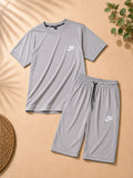Premium men's light grey t-shirt and shorts co-ord set crafted from soft, breathable fabric. Includes a classic crew neck t-shirt and matching elastic waist shorts with side pockets, ideal for summer casual wear, fitness, travel, and everyday comfort
