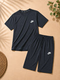 Premium men's black t-shirt and shorts co-ord set crafted from soft, breathable fabric. Features a classic crew neck t-shirt and matching elastic waist shorts with side pockets, ideal for summer casual wear, fitness, travel, daily comfort, and active lifestyles.